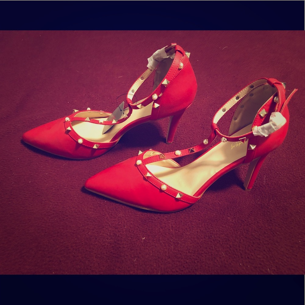 Studded closed toe night on the town 2 inch pumps